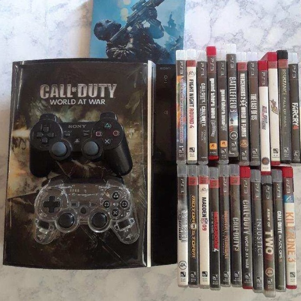 Ps3 console,26 games,2 controls,cords